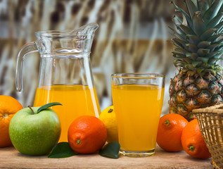 orange juice in a glass on a table