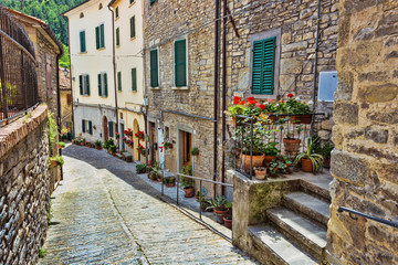Naklejka na ściany i meble Italian street in a small provincial town of Tuscan