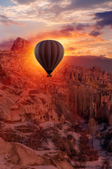Hot air balloon flying over spectacular Cappadocia