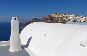 roof of whitewashed Cycladic house in Fira town on Santorini