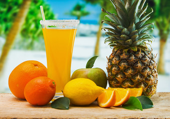 orange juice in a glass on a table