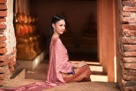 Women In Thai Dress At The Old Temple. Noppamas Queen Contest In Loy Kratong Tradition.

