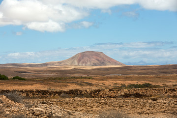 Fototapeta na wymiar Beautiful volcanic mountains on Fuerteventura. Canary Islands. Fuerteventura. Canary Islands