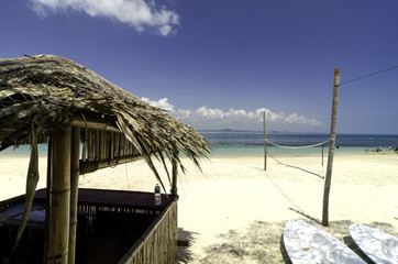 beautiful scenery tropical sea view at Kapas Island, Malaysia.Bamboo hut and kayaks.white sandy beach and clear water with blue sky background.image taken at Kapas Island (Cotton Island), Malaysia