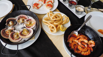 Spanish cuisine. Table with a variety of dishes