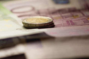 Euro coins and banknotes money. Macro background.

