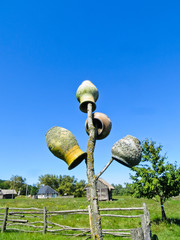Old traditional ukrainian clay pots on a fence