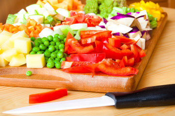 Chopped vegetables on cutting board