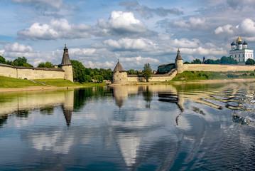 View of the Pskov Kremlin from Velikaya River in the summer in a sunny weather