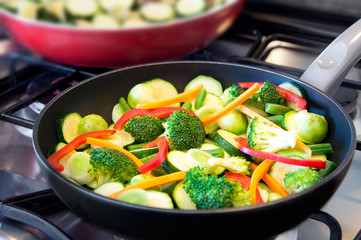 Vegetables cooking on frying pan