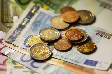 Euro coins and banknotes money. Macro background.
