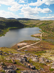 Fototapeta na wymiar road in tundra in the north of Russia