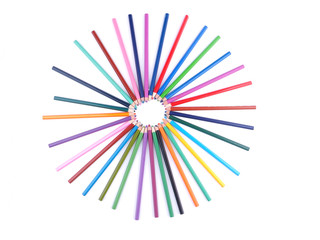 colored pencils on white background