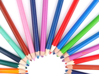 colored pencils on white background