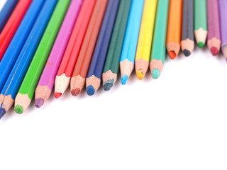 colored pencils on white background
