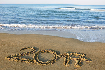 2017 written on the beach