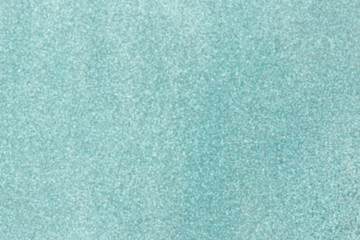 Christmas background. Blue bokeh festive abstract background with bokeh defocused lights and stars