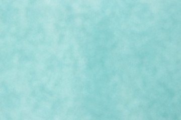 Christmas background. Blue bokeh festive abstract background with bokeh defocused lights and stars