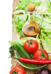 Set vegetable and jug of vegetable oil isolated