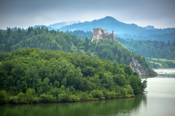 Medieval Czorsztyn castle at the lake in Poland