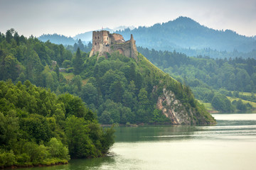 Medieval Czorsztyn castle at the lake in Poland