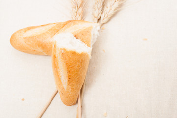 Fresh baked traditional bread and wheat