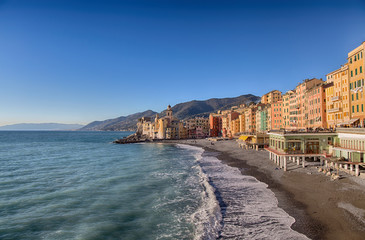 Fototapeta na wymiar Small beautiful Mediterranean city at the time sunrise - Camogli, Genoa; Italy, European trip