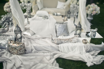 The luxury sofa with decorations in the park