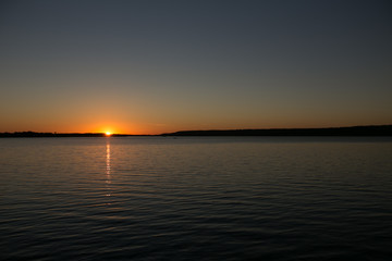 Sunset on a calm lake in Ontario Canada