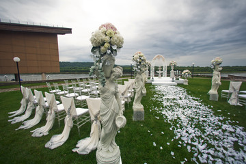 The archway and chairs on the wedding ceremony