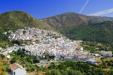 Overall view of Ojen - typical white town in Andalusia, southern Spain, province Malaga © kazmulka