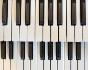 Top down view of piano keys.