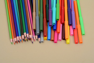 Colorful pencils and markers - art concept