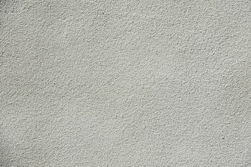 Empty stone wall. White stone background. Blank backdrop with nice texture and copy space.