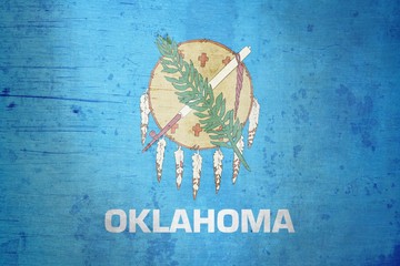 A grunge illustration of the state flag of Oklahoma 