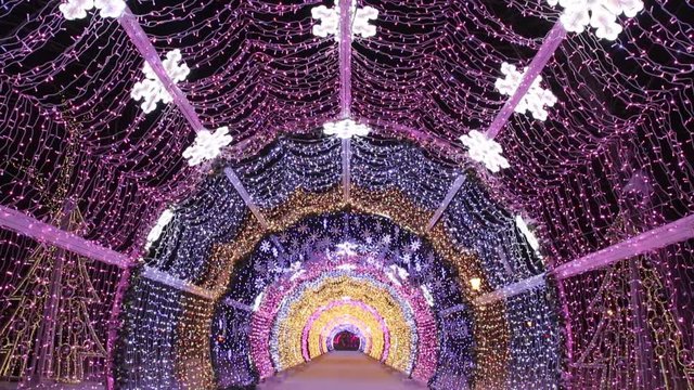 Christmas night on Tverskoy Boulevard in Moscow. Glowing decorative tunnel