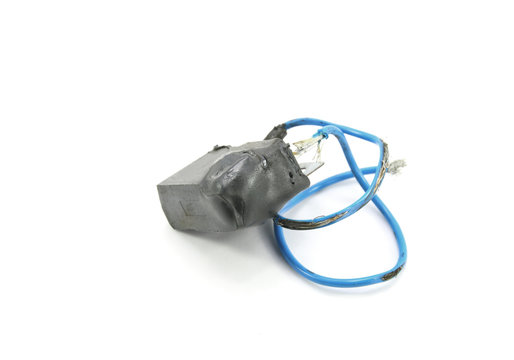 Broken capacitor on white background