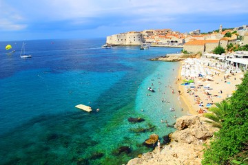 Beautiful beach Banje and Dubrovnik touristic destination in background, Croatia