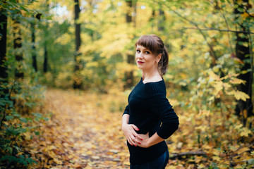 girl in a beautiful autumn forest, autumn alley