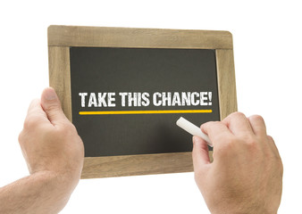 Take this Chance! Hand writing on chalkboard