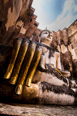  Old big Buddha statue at Wat Si Chum on december 3, 2015 Sukhothai Province, Thailand.