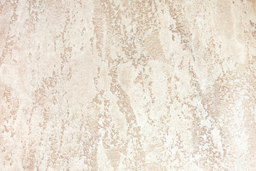 Wall with light brown color decorative plaster. backgrounds textured