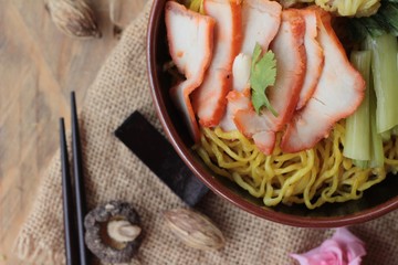 Egg noodles with pork and dumpling is delicious.