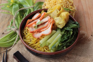 Egg noodles with pork and dumpling is delicious.