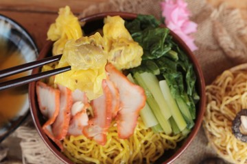 Egg noodles with pork and dumpling is delicious.