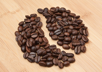 coffee beans on a wooden background