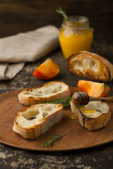 Ciabatta Bread with honey, persimmon and rosemary