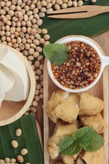 Fried tofu, chinese vegetarian food with sauce.