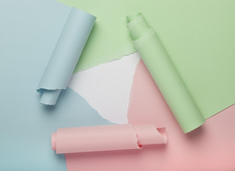 Abstract torn colored paper background