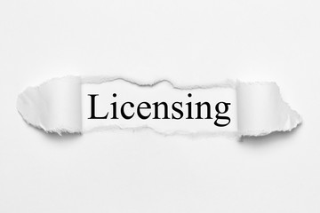 Licensing on white torn paper